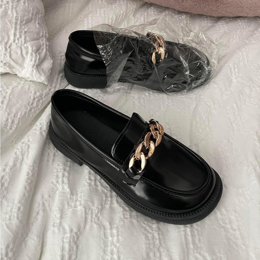 Black loafers